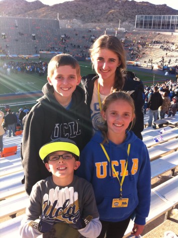 Lindsey enjoys a UCLA football game with her family.