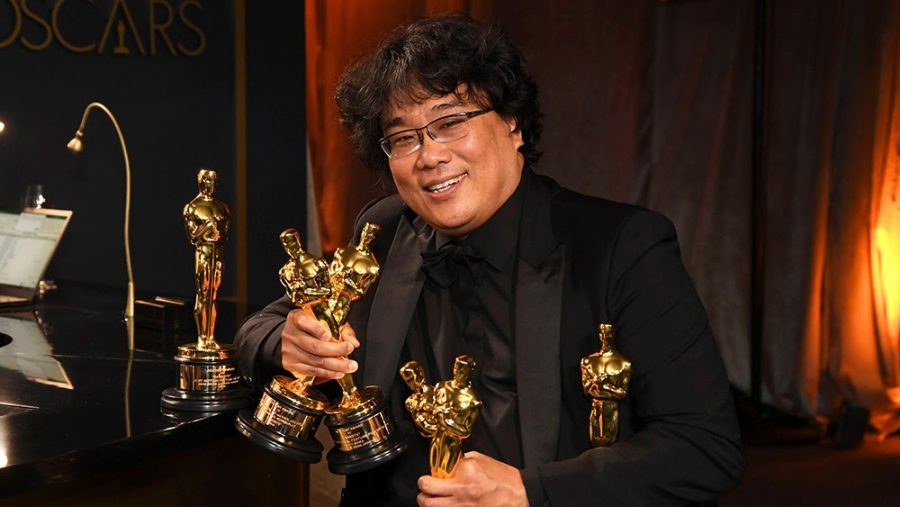 Director Bong Joon-ho with his Oscars. Photo by Richard Shotwell.
