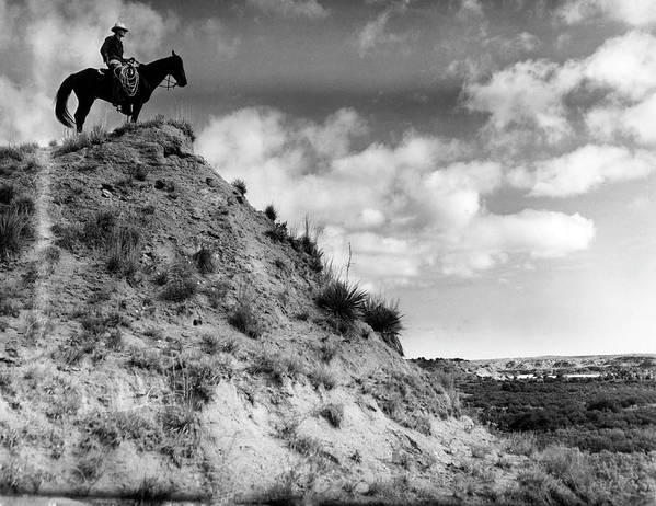 cowboy-on-horseback-at-the-matador-ranch-hansel-mieth