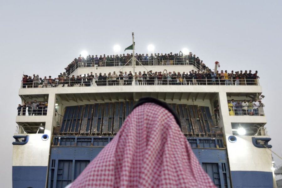 A boat carrying people from more than 50 countries arrives at the King Faisal Naval Base in Jeddah, Saudi Arabia, after they fled the violence in Sudan on Wednesday, April 26. Amer Hilabi/AFP/Getty Images
