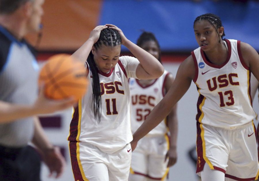 Southern Californias Destiny Littleton (11) and Rayah Marshall (13) react to a missed scoring opportunity during overtime against South Dakota State in a first-round college basketball game in the womens NCAA Tournament, Friday, March 17, 2023, in Blacksburg, Va. (AP Photo/Matt Gentry)