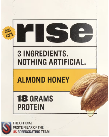 A photo of the packaging of a Rise Protein Bar, the official protein bar of the US Speedskating Team! These bars have 3 ingredients that are considered clean! Photo courtesy of iHerb. 