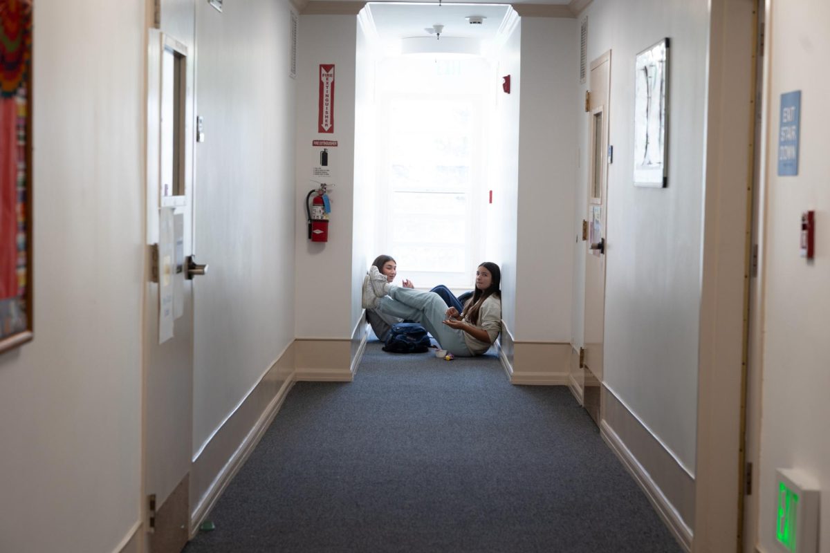 Students in conversation in the Butler Hallways